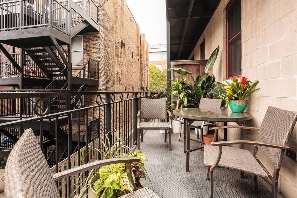 Kitchen Balcony with Weber Grill, Flowers, and Seating