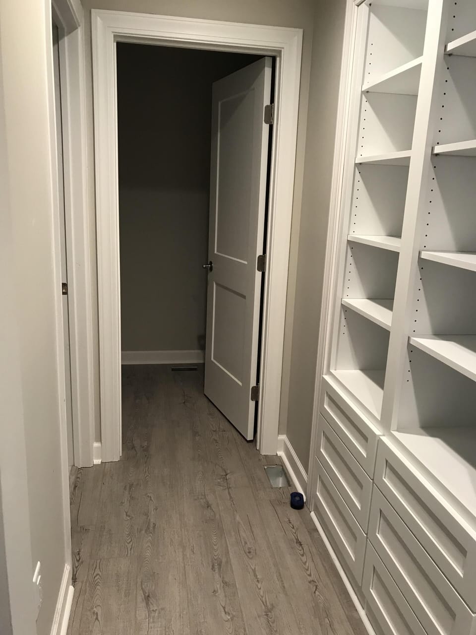 Master Bedroom dressing area and closet with built in cabinets 