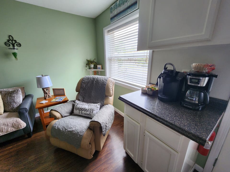 Coffee bar  with reliner and lots of natural sunlight to enjoy your morning.