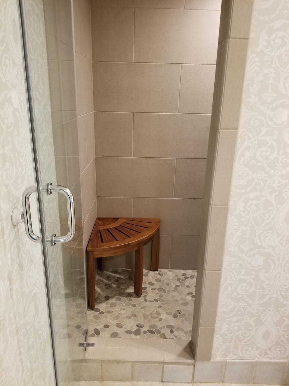 Newly tiled Walk in shower with hand held shower head