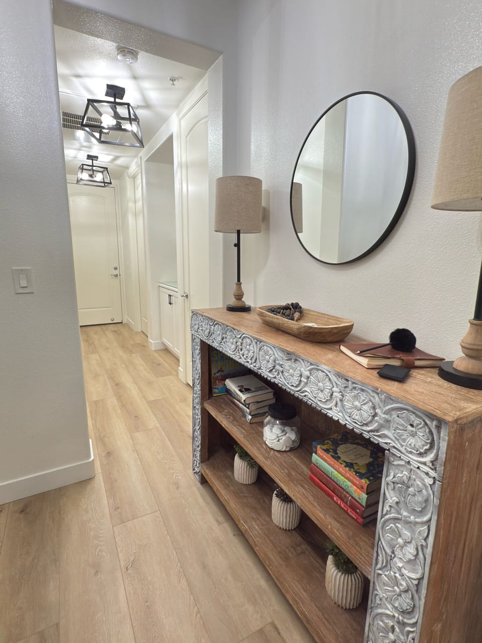 Entrance and hall to two of the bedrooms/ bath and laundry.
