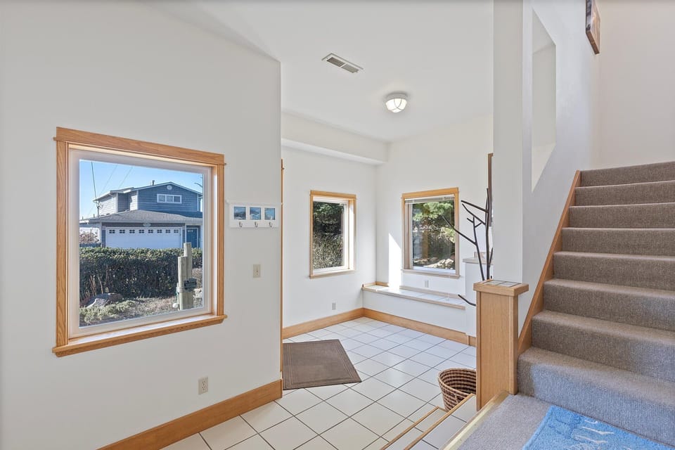 Entry with stairway leading to the main floor