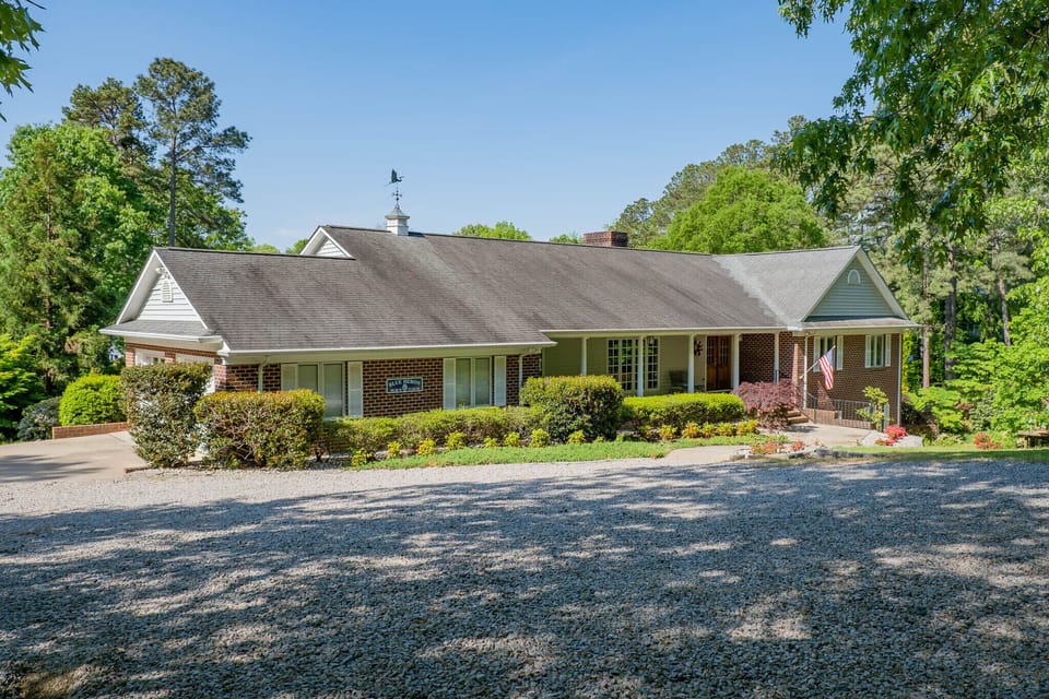 2 paved parking spots and 6+ gravel parking spots with circle drive