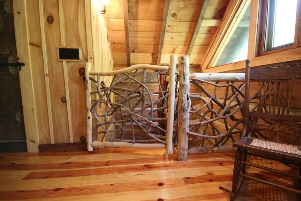 Gated top of stairs with latch.