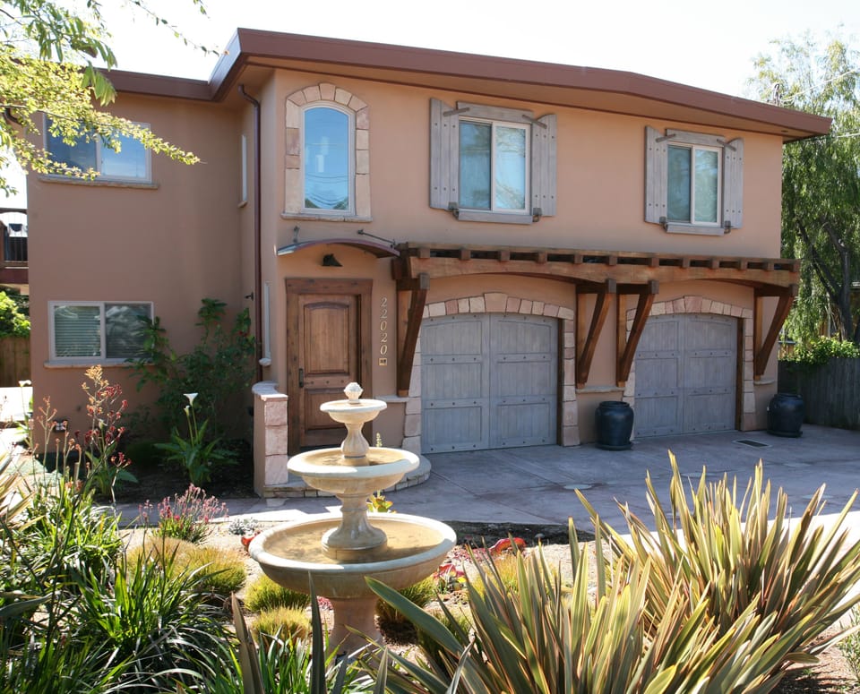 Meticulously crafted exterior radiates Mediterranean charm.