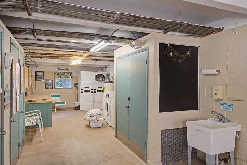 laundry room, Ice machine and sink tub to rinse anything off and tide charts
