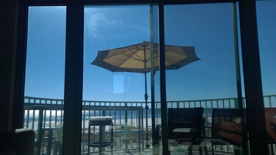 Your personal deck over looking the beach and the ocean just steps away.