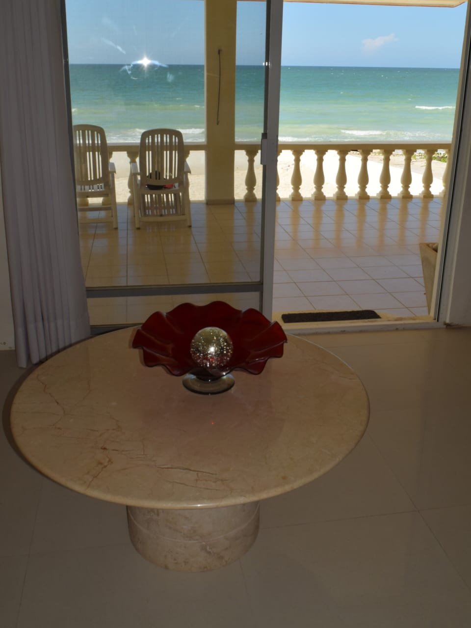 Living area overlooking the beachfront terrace
