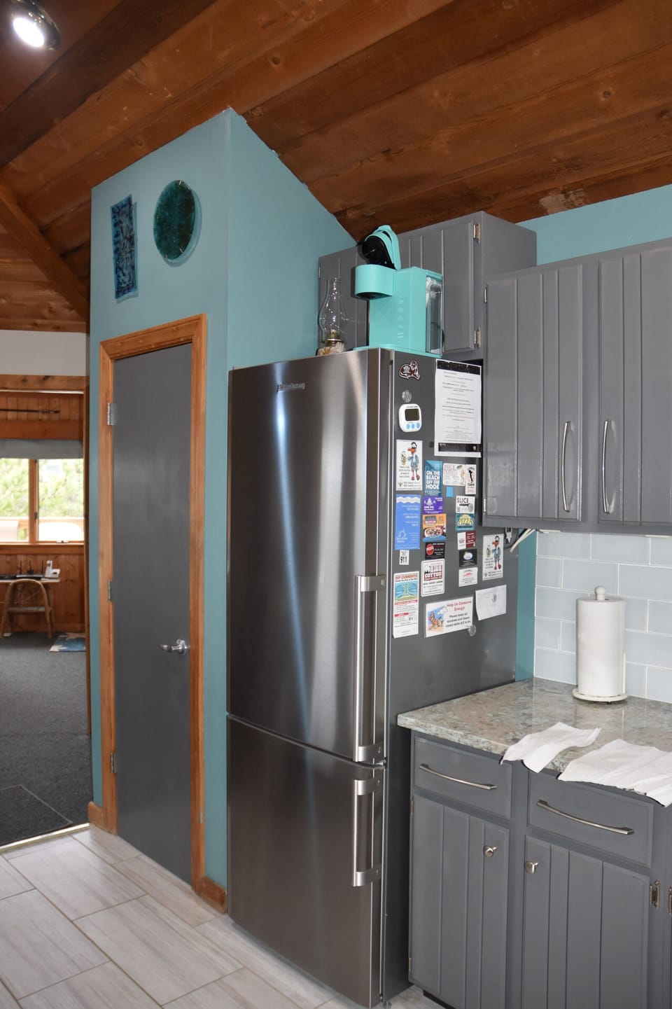 Kitchen with one of two refrigerators, the 2nd is downstairs.