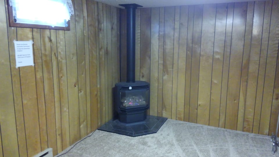 Basement Gas Fired Fire Place 
Plenty of space to dry off that Ski gear 
