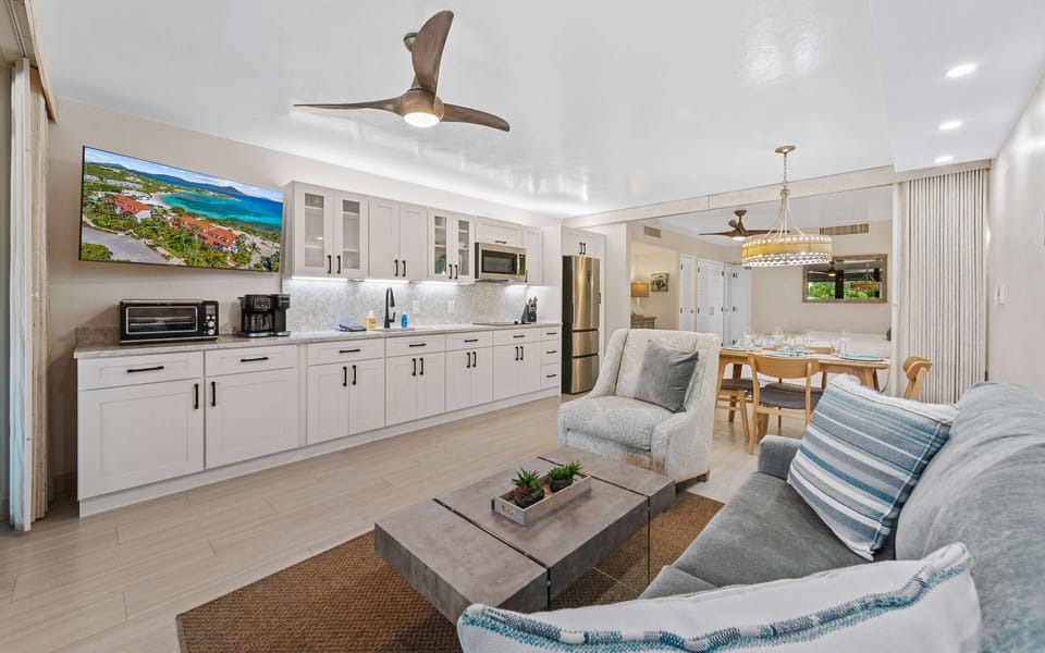 Living Room/Kitchen with Large Screen Smart TV.  