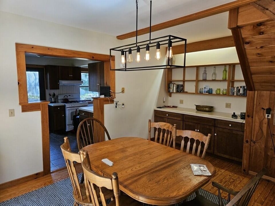Dining area with peek into the fully equipped kitchen.