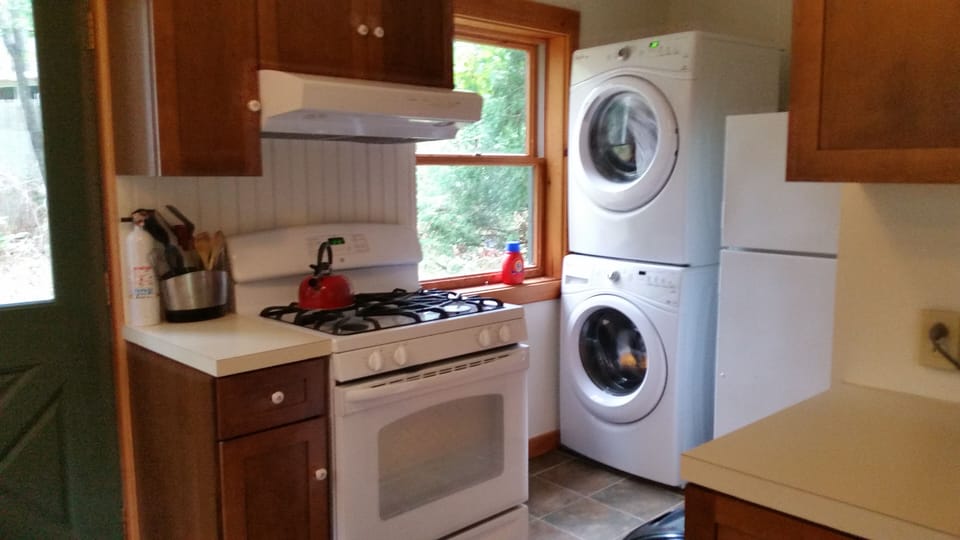Full sized washer and dryer in the kitchen.