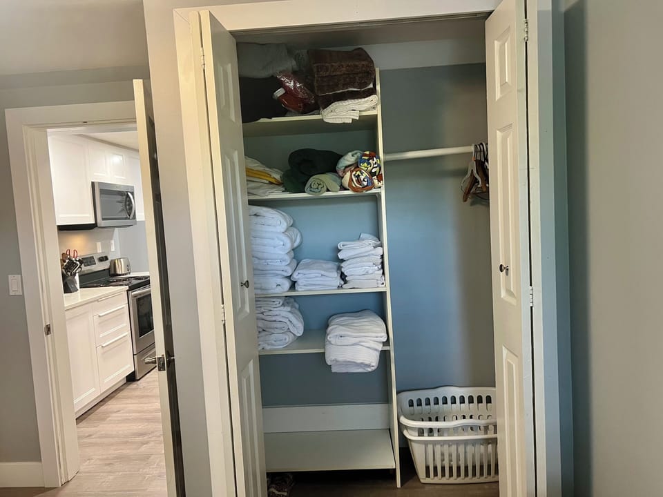 The 2nd bedroom closet has plenty of towels, pool towels and facecloths stored.