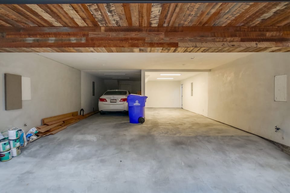 Tandem parking on right side for 2 vehicles. Recommend smaller vehicles