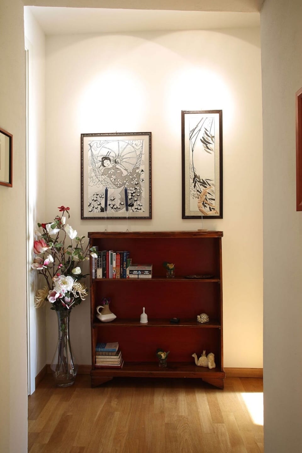The hallway to main bath room and laundry room (left) the main bedroom (right)