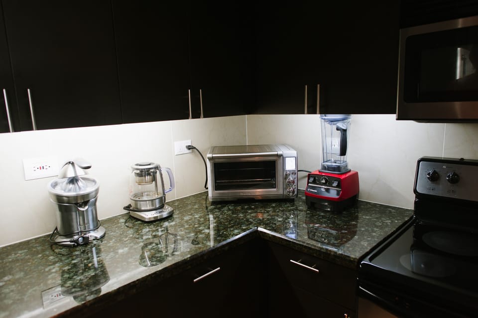 Wide variety of top of the line kitchen equipment including espresso machine. 