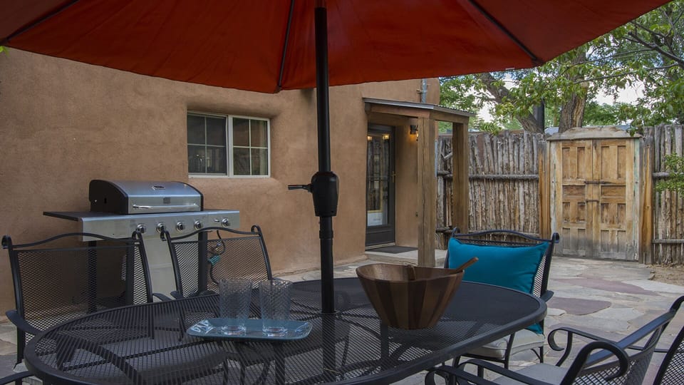 Full outdoor dining suitable for enjoying the big sky of Santa Fe