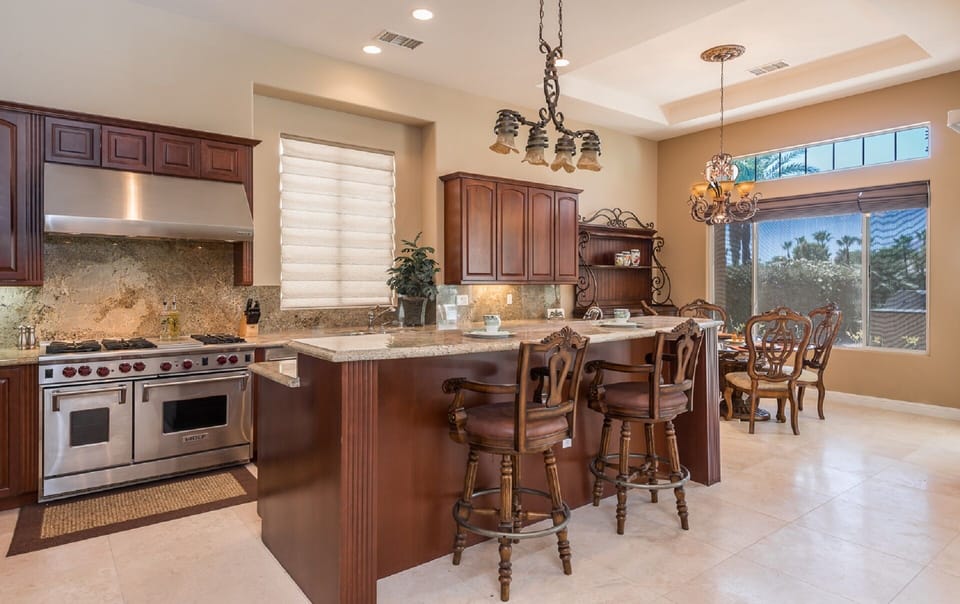 Wolf Appliances, 3 sinks, and a Sub Zero Frig to stimulate your Gourmet Chef!