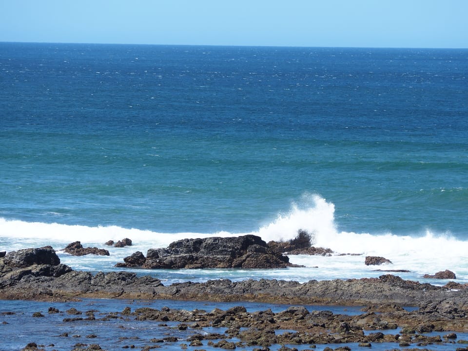 surf hitting the reef