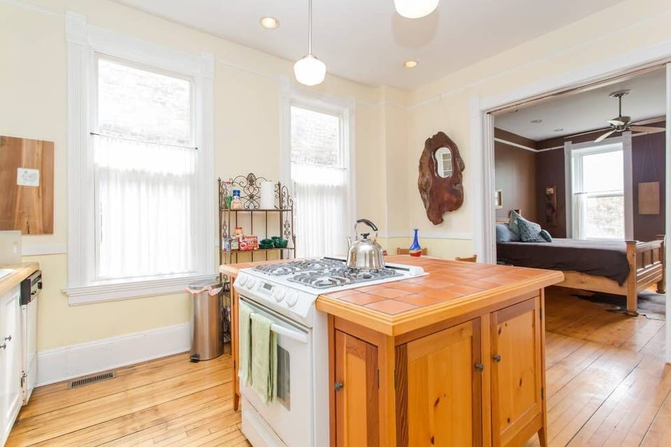 Kitchen and view into the bedroom