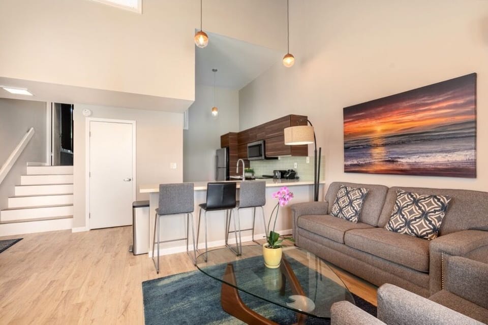 living area 16B with stairs to bedrooms