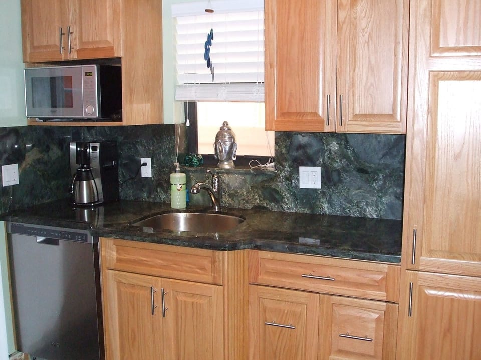 Gorgeous quartz countertops, custom cabinets, Chef's kitchen fully stocked!
