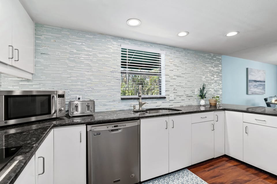 Kitchen with modern appliances and ample work space.