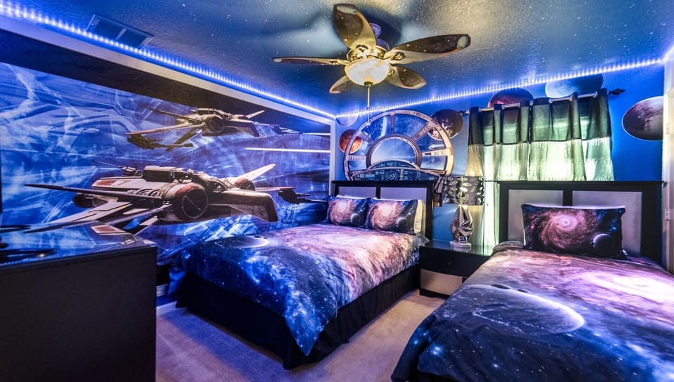 Kids will love the upstairs bedroom with a cool Star War theme.