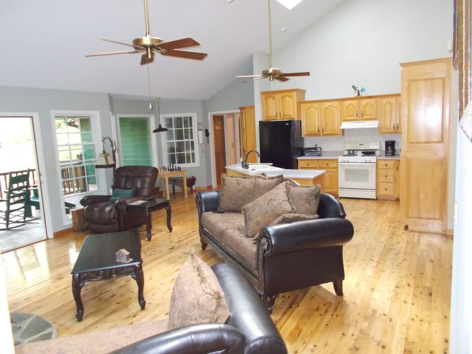 Leather Chair and New Couches. Wood floors throughout the house