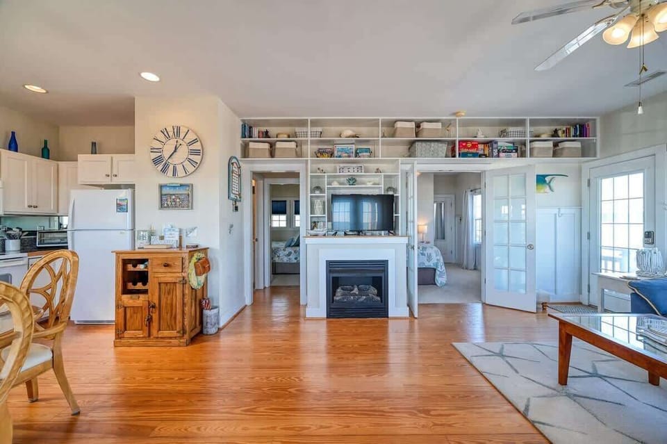 Oceanfront Living Room with Wall to Wall Windows
