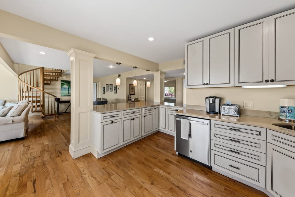 The kitchen is open into the living area. It has been beautifully renovated.