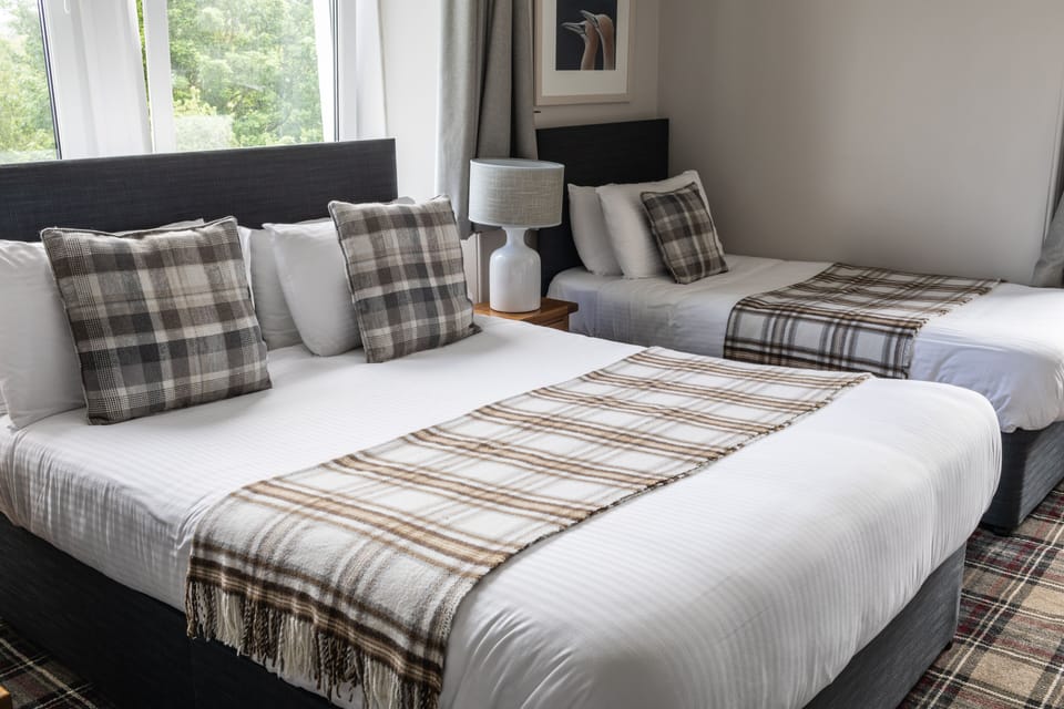 Standard Quadruple Room, Multiple Beds, Non Smoking, Ensuite | Individually decorated, free WiFi, bed sheets