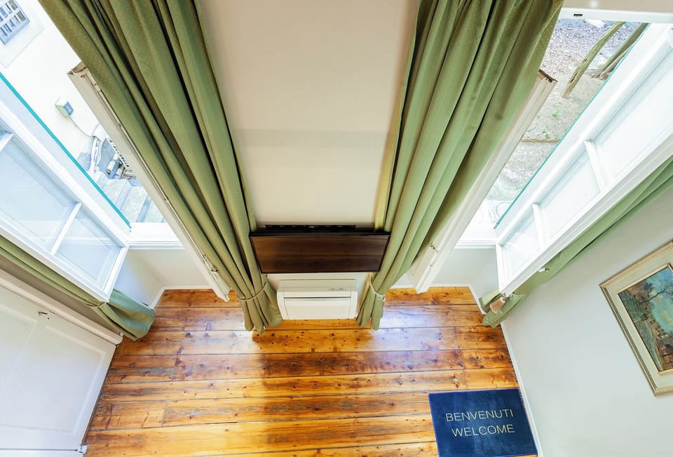 Duplex, 1 Bedroom | Living area | Flat-screen TV