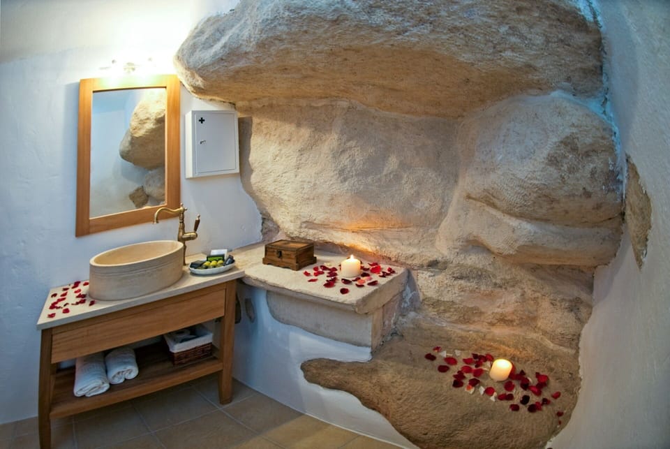 a toilet with inside the rocks