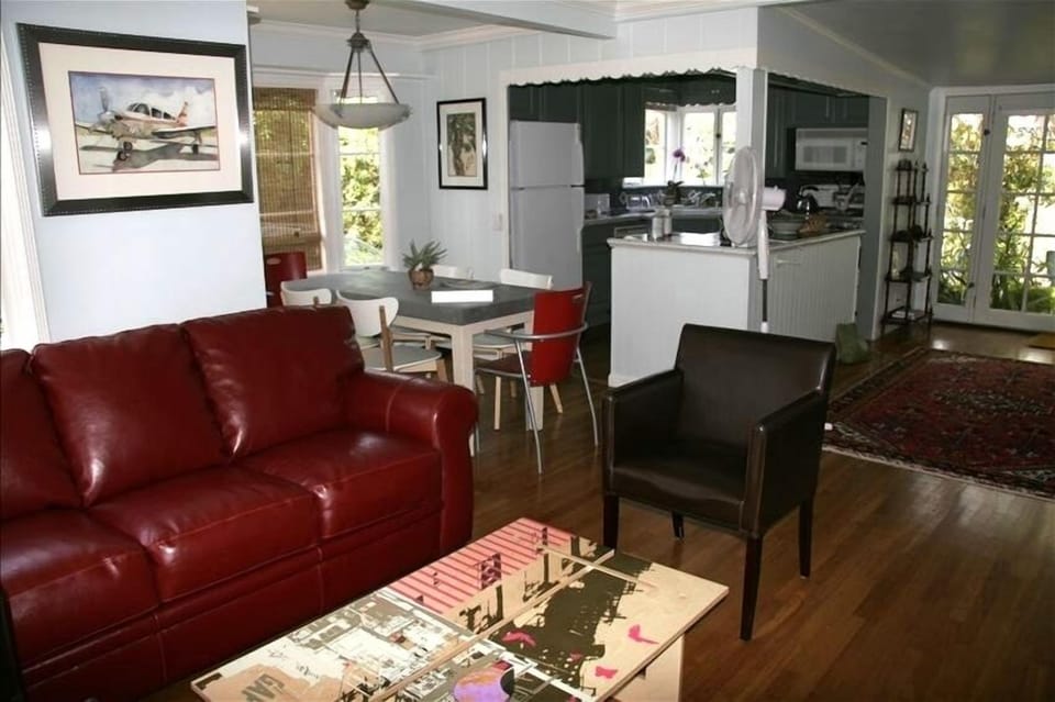 Living room, dining room and kitchen area