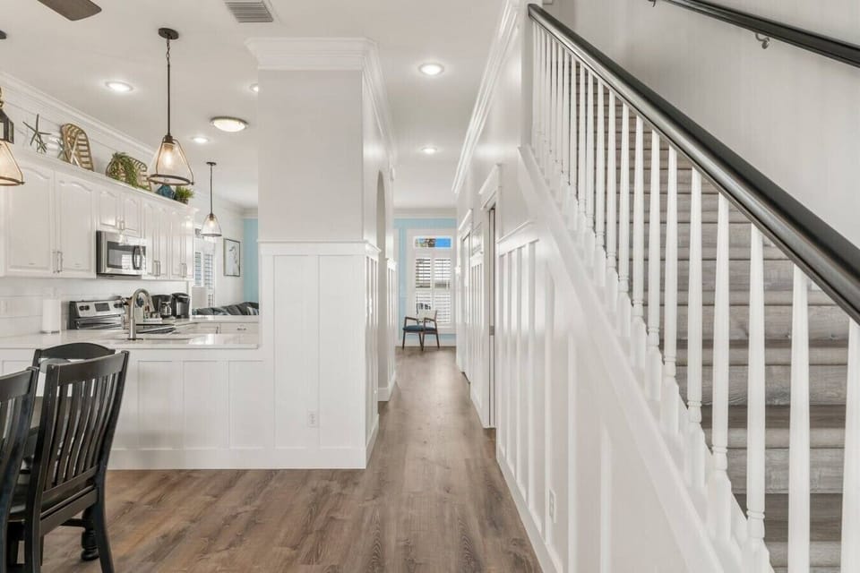 Open concept floor plan where kitchen is open to dining area and living room.