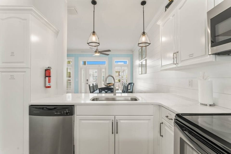 Counter height opening to dining area and living room.