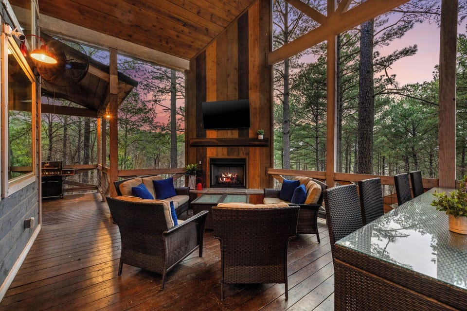 The covered deck offers the perfect blend of comfort and nature—ideal for morning coffee or evening wine.