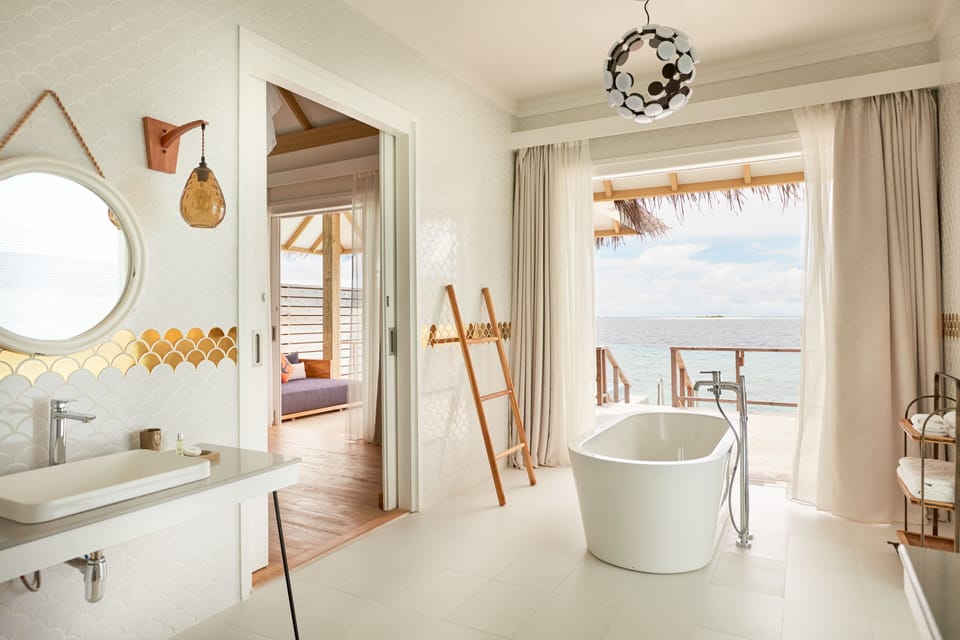 Separate tub and shower, rainfall showerhead, free toiletries