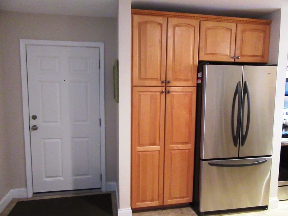 New exterior door and loads of kitchen cabinets