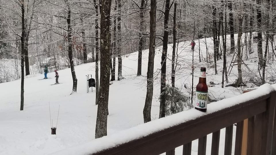 Ski On, Ski Off!! Watch skiers fly by from deck!!