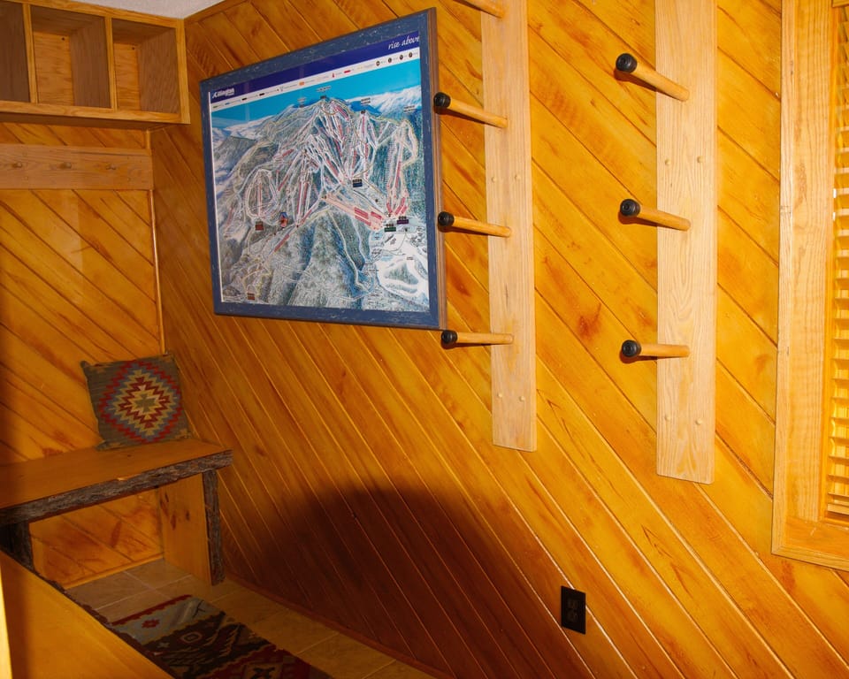 Mudroom entry designed with lots of storage for all your ski and snowboard gear