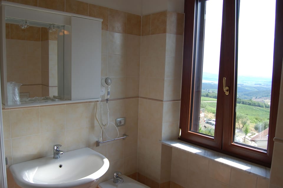 Standard Double Room, Private Bathroom, Tower | Bathroom | Shower, free toiletries, hair dryer, towels