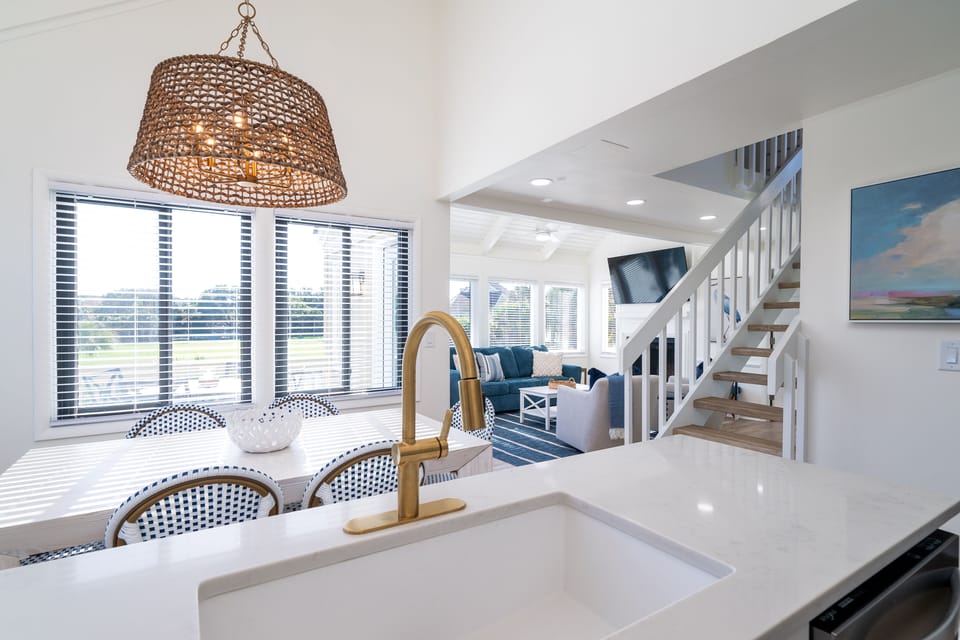 The kitchen, dining and living areas all flow together