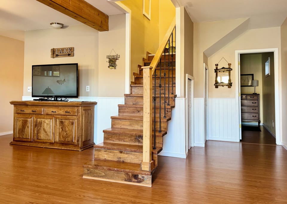 Laundry area under the stairs (detergent provided)