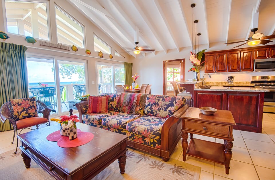 Spacious open floor plan - dining table seats 6 with 5 more at kitchen counter