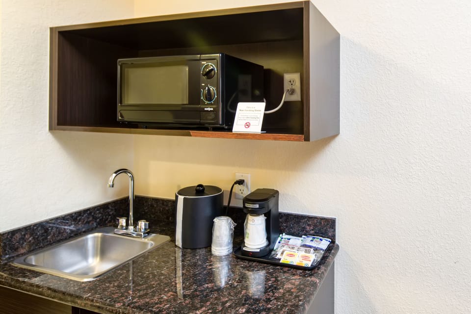 Standard Room, 2 Queen Beds | Private kitchenette | Coffee/tea maker, fridge, microwave