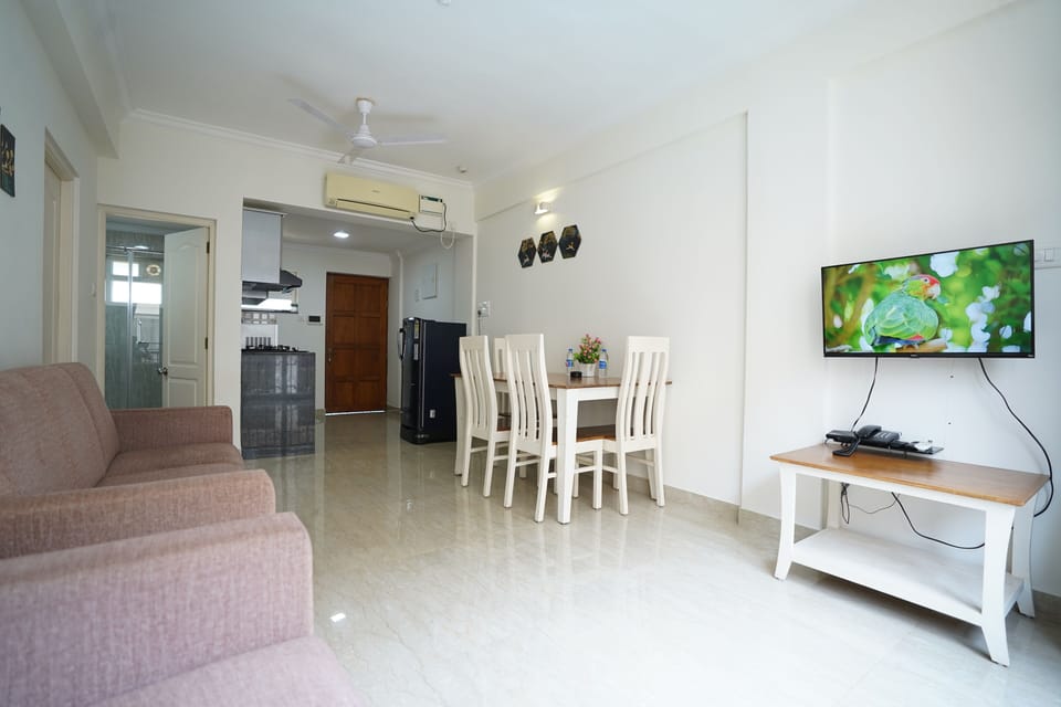 1BHK Service Apartment | Living area | 32-inch LED TV with satellite channels, TV