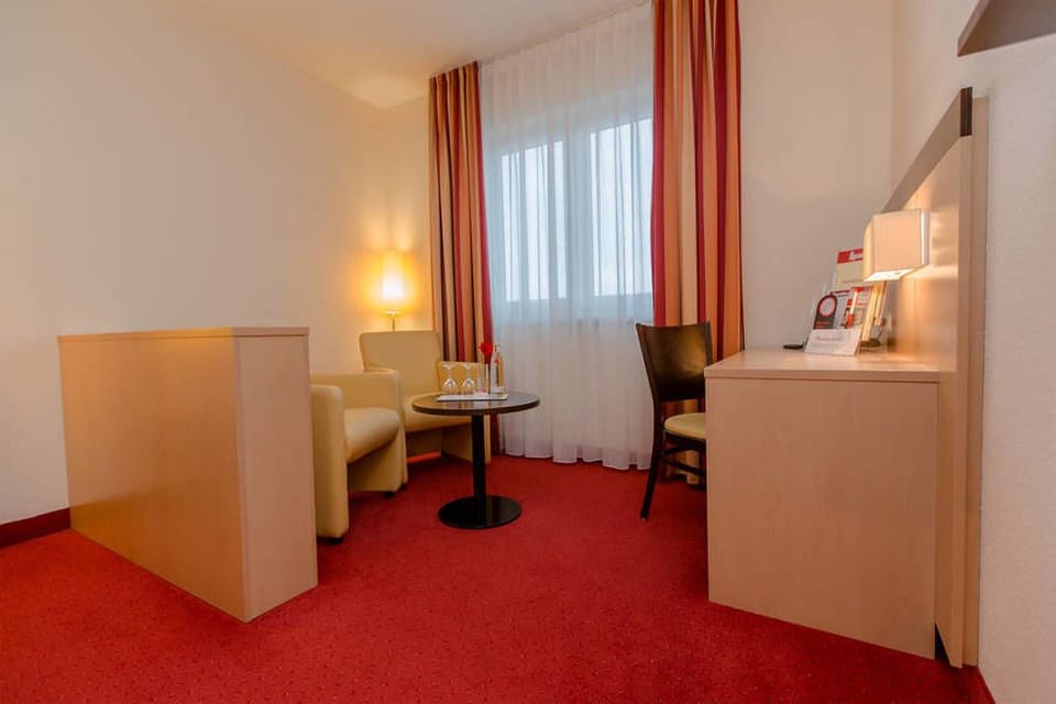 Comfort Double Room | Living area | Flat-screen TV